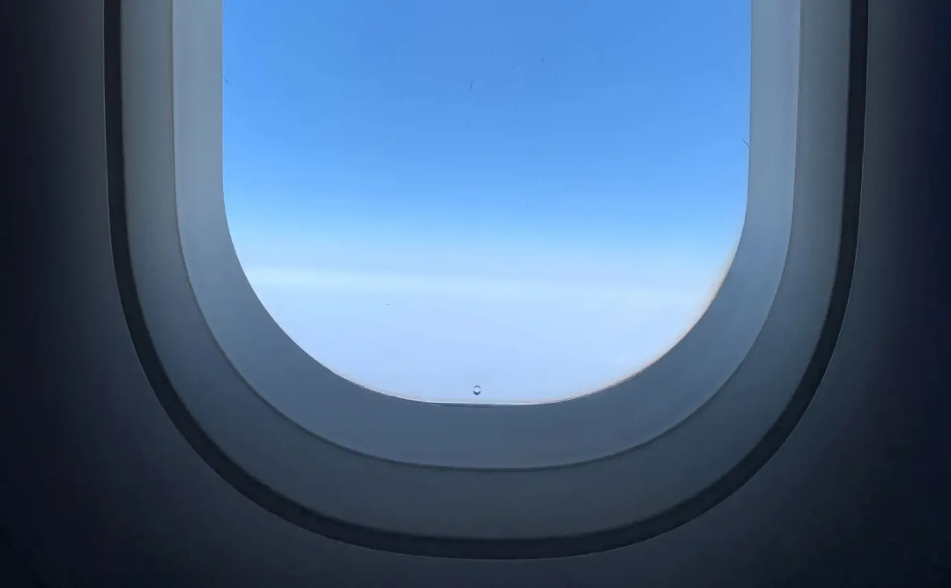 Why do airplane windows have small holes?